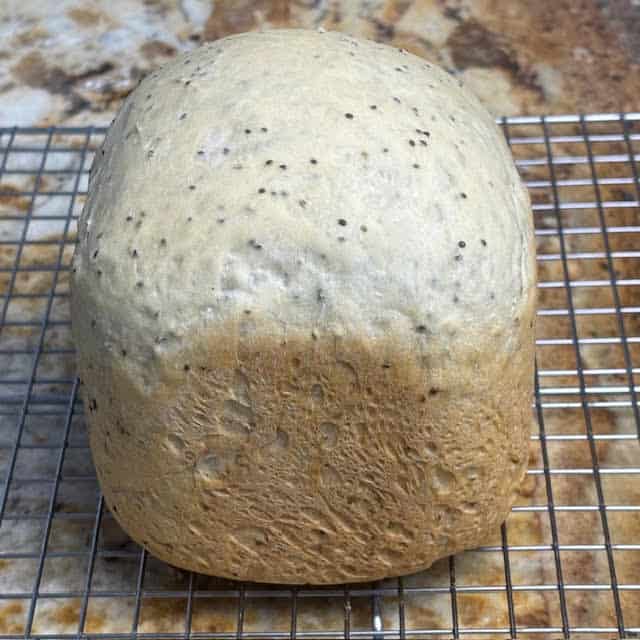 1 lb bread machine chia seed bread on wire cooling rack.