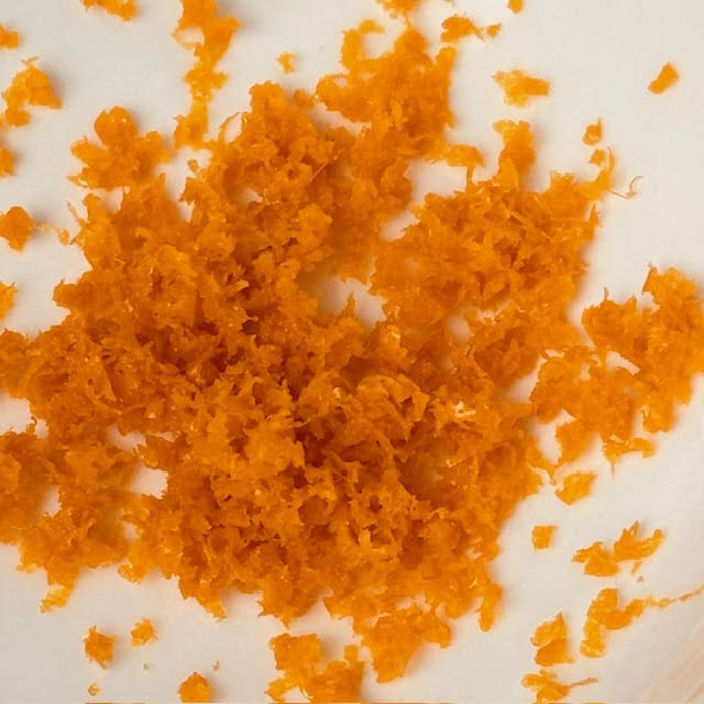 Orange zest in bowl.