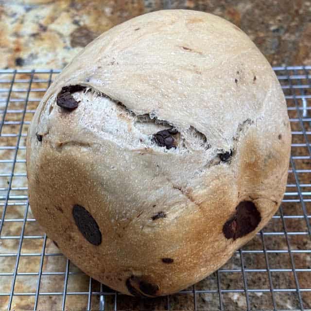 1 lb bread machine chocolate chip bread on a wire cooling rack.