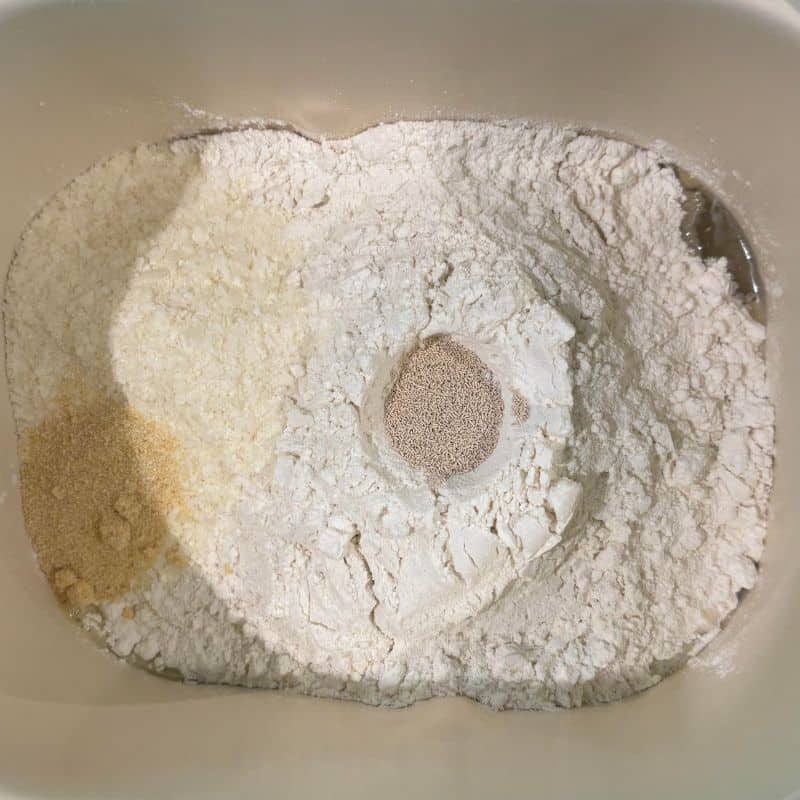 The ingredients for a low sodium bread machine recipe in a bread pan.