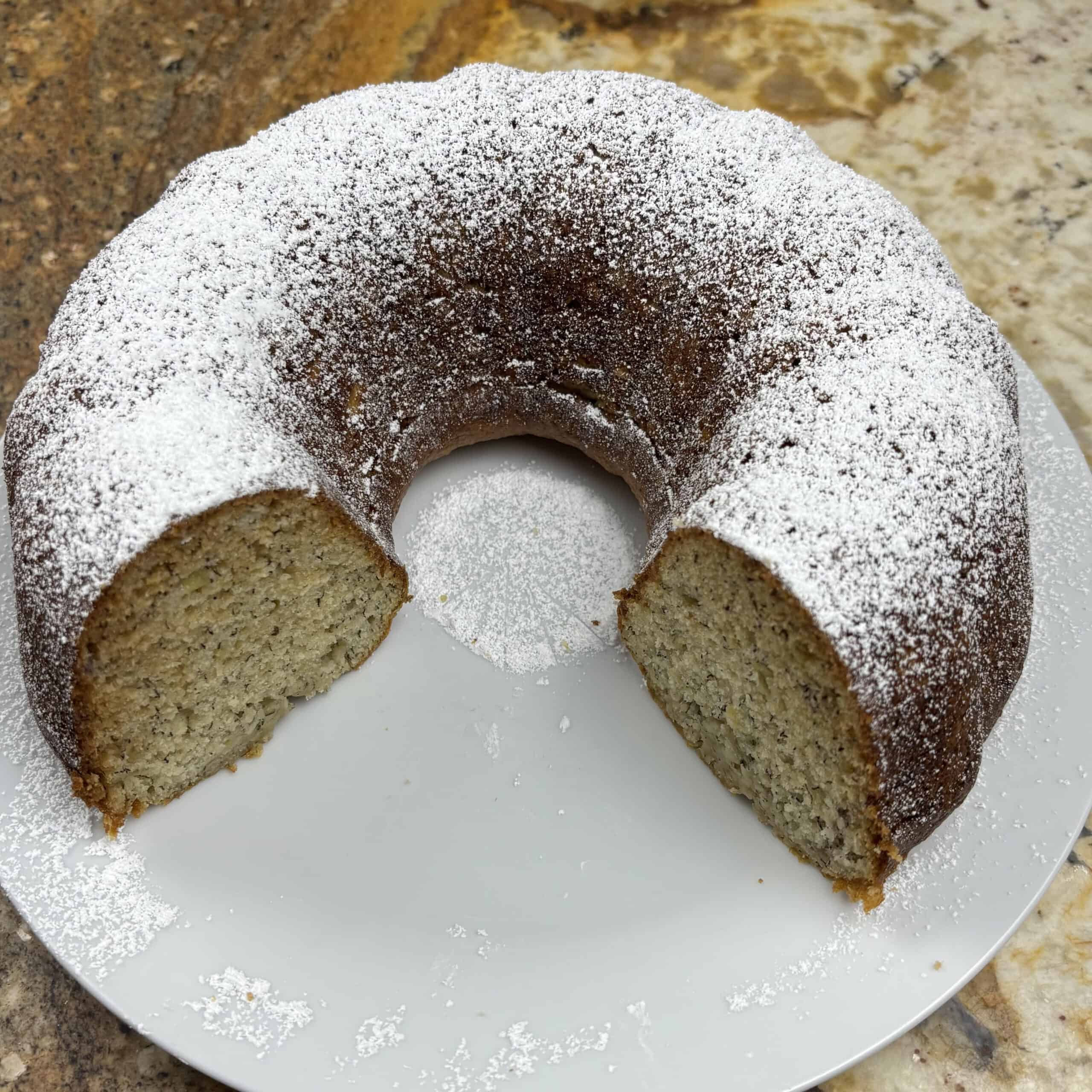 Bundt banana bread on a white plate.